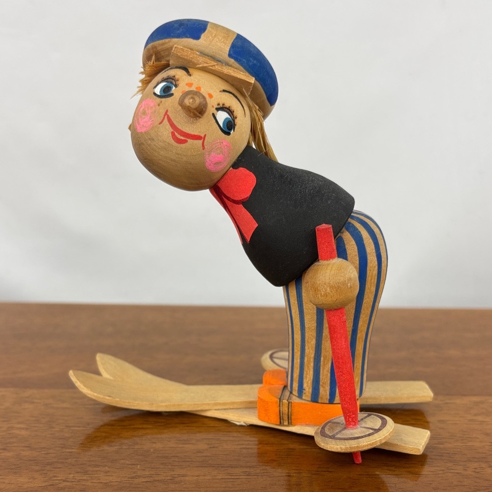 Vintage Russian Folk art wooden skier figurine